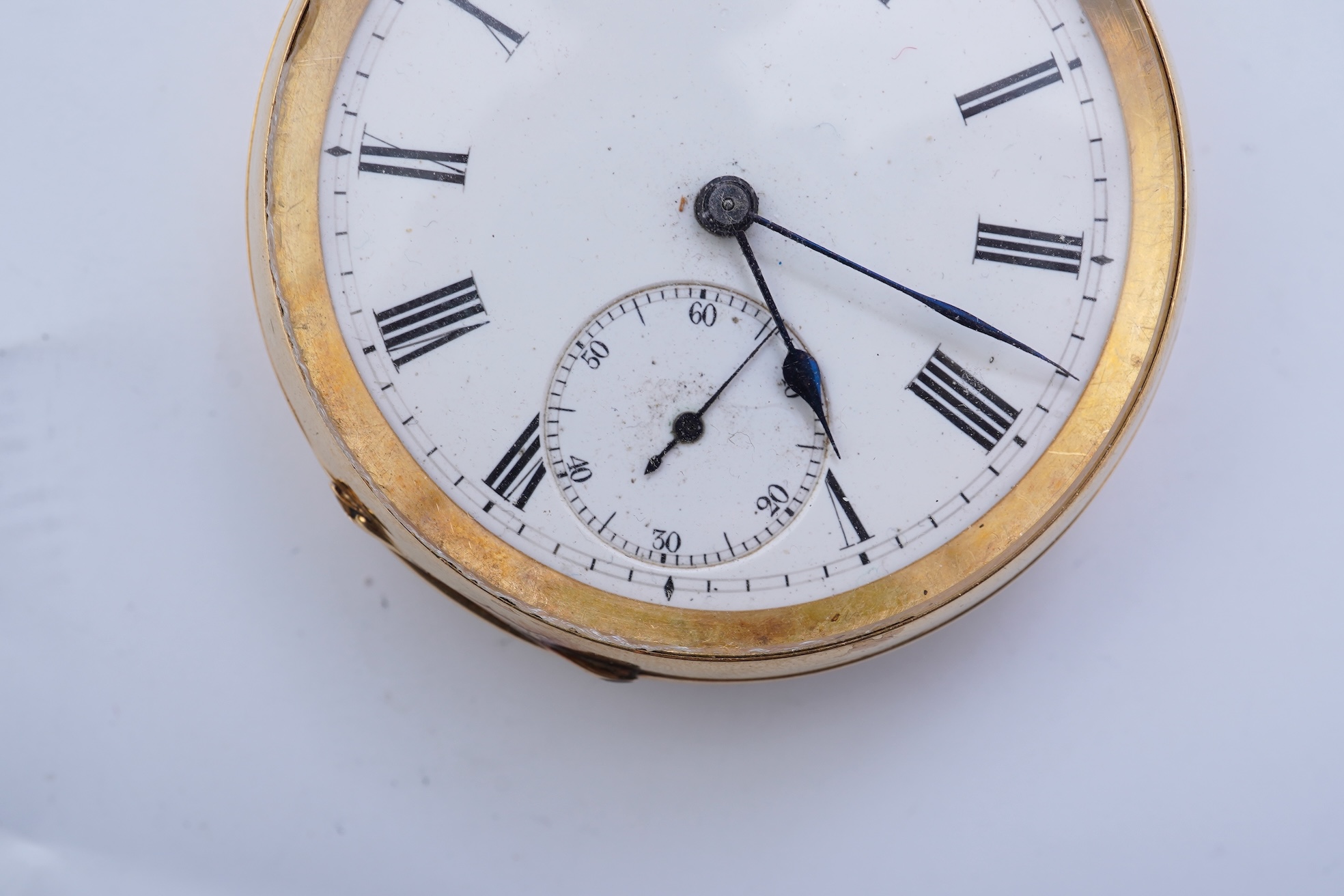 A continental 18k gold open faced keyless lever pocket watch, with a 9ct albert